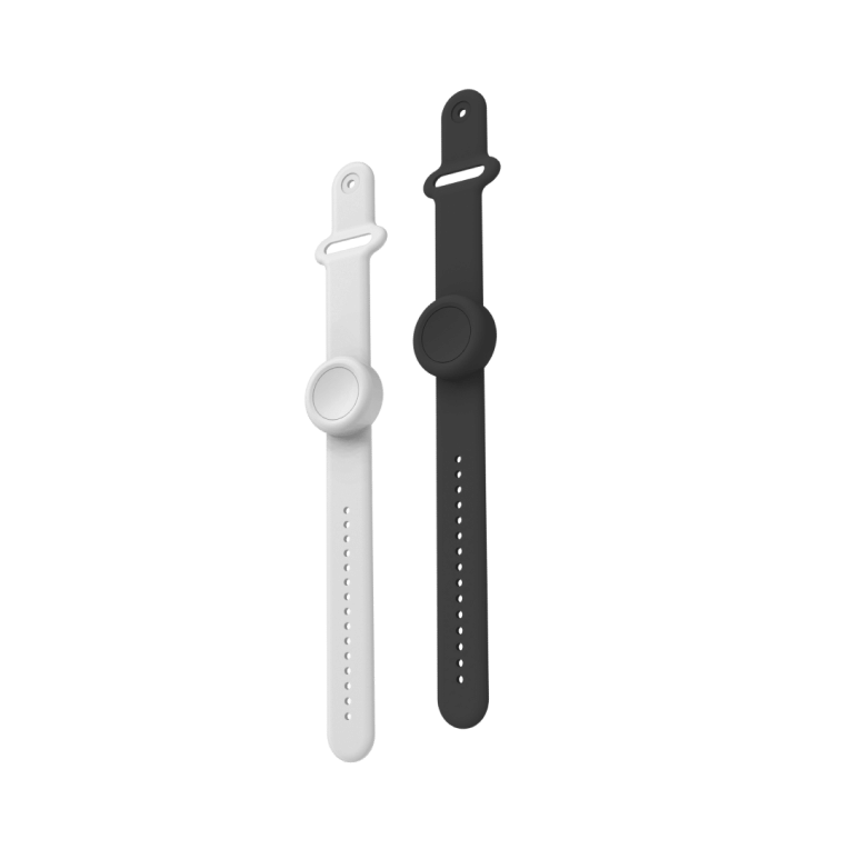 White and black Flic wristbands on a clean background.