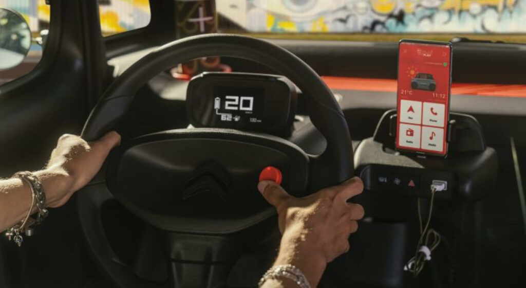 A Flic button in a Citroën vehicle interior.